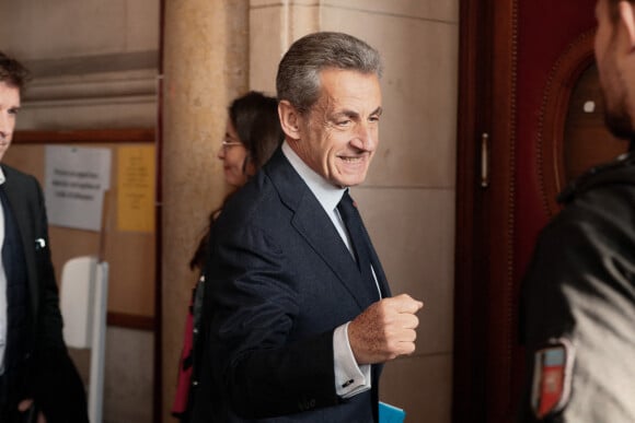 L'ancien président français Nicolas Sarkozy arrive au palais de justice pour l'audience d'appel d'un procès pour corruption au palais de justice de Paris le 15 décembre 2022.