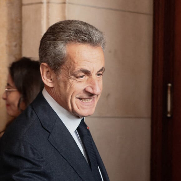 L'ancien président français Nicolas Sarkozy arrive au palais de justice pour l'audience d'appel d'un procès pour corruption au palais de justice de Paris le 15 décembre 2022.