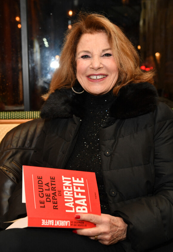 Exclusif - Nicole Calfan - Laurent Baffie fête son succès littéraire "1 Million de livres vendus" aux Deux Magots à Paris le 8 mars 2023. © Veeren/Bestimage 