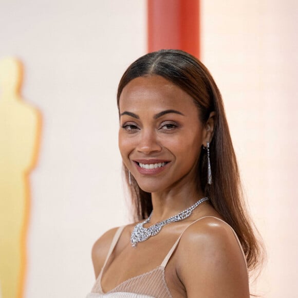 Zoe Saldana - 95e édition de la cérémonie des Oscars à Los Angeles, le 12 mars 2023.