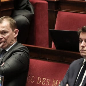 Le ministre français du Travail, Olivier Dussopt et le ministre délégué aux Comptes publics, Gabriel Attal, lors du débat sur le projet de loi relatif à la réforme du système de retraite, à l'Assemblée nationale, à Paris, le 6 février 2023 © Stéphane Lemouton / Bestimage