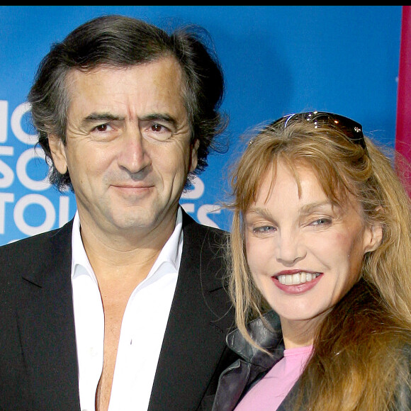 Bernard Henri Levy & Arielle Dombasle a l'avant premiere du film ' Podium ' au cinema Paramount Opera suivi de la soiree de l'avant premiere a l'Olympia .  