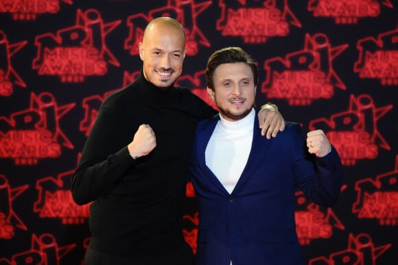 Carlito (David Coscas) et McFly (Raphaël Carlier) lors de la 23ème édition des NRJ Music Awards 2021 au Palais des Festivals de Cannes, le 20 novembre 2021.