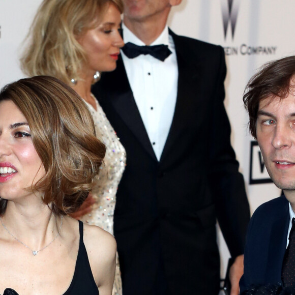 Ainsi, alors que Lourdes Leon, fille de Madonna, ou encore Shiloh Jolie Pitt, la fille des ex-Brangelina, font déjà parler d'elles, la fille de Sofia Coppola, Romy Mars, elle, est encore bien méconnue du public.
Sofia Coppola et son mari Thomas Mars - Photocall de la soirée "AmfAR's 21st Cinema Against AIDS" à l'Eden Roc au Cap d'Antibes lors du 67ème festival du film de Cannes, le 22 mai 2014.