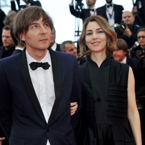 Les Nepo baby n'ont pas fini de faire rêver, d'être jalousés ou parfois même détestés.
Sofia Coppola et son mari Thomas Mars - Montée des marches du film " Saint Laurent" lors du 67 ème Festival du film de Cannes – Cannes le 17 mai 2014.