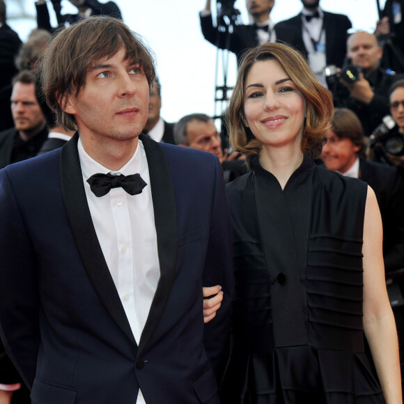 Les Nepo baby n'ont pas fini de faire rêver, d'être jalousés ou parfois même détestés.
Sofia Coppola et son mari Thomas Mars - Montée des marches du film " Saint Laurent" lors du 67 ème Festival du film de Cannes – Cannes le 17 mai 2014.