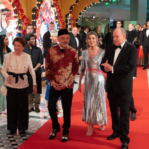 Christian Louboutin, la princesse Caroline de Hanovre, le prince Albert II de Monaco - Arrivée de la famille princière au Bal de la Rose 2023 sur le thème "Bollywood" à la salle des étoiles à Monaco le 25 mars 2023. © Olivier Huitel / Pool / Bestimage 