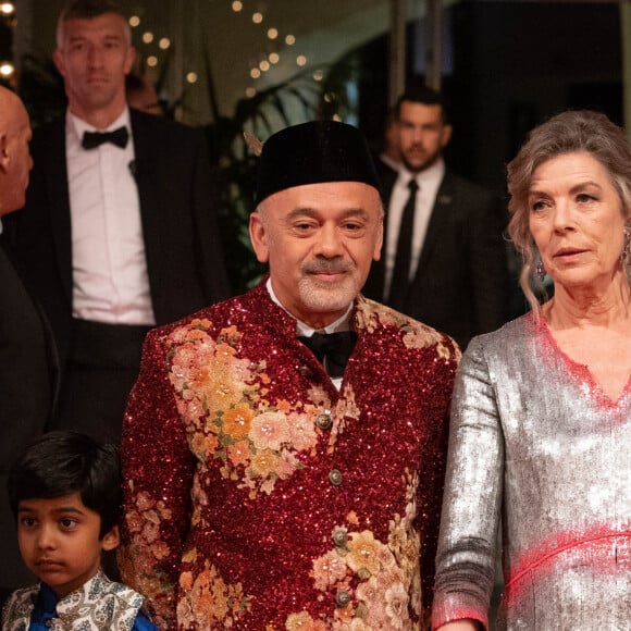 Christian Louboutin et la princesse Caroline de Hanovre - Arrivée de la famille princière au Bal de la Rose 2023 sur le thème "Bollywood" à la salle des étoiles à Monaco le 25 mars 2023. © Olivier Huitel / Pool / Bestimage 