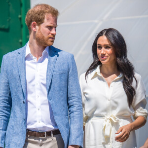 Le prince Harry et Meghan Markle avaient exposé leur fils Archie pour la première fois en Afrique du Sud. 
Le prince Harry, duc de Sussex, et Meghan Markle, duchesse de Sussex, visite l'association "Yes" (Youth Employment Service) qui oeuvre pour résoudre le problème du chômage des jeunes en Afrique du Sud. Johannesburg. 