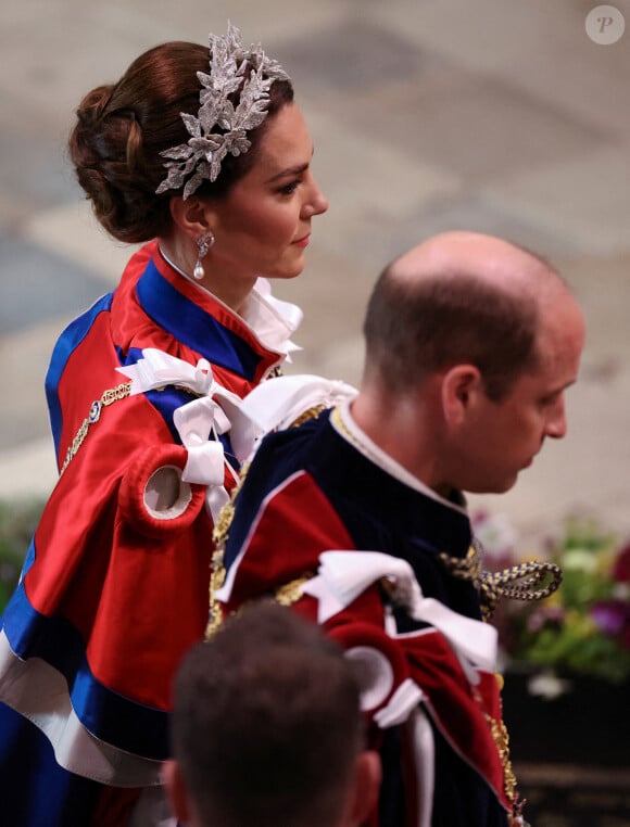 Alors que Kate Middleton, princesse de Galles, a opté pour l'un de ses créateurs préféré Alexander McQueen, en revêtant une superbe robe ivoire en crêpe de soie.
Le prince William, prince de Galles, et Catherine (Kate) Middleton, princesse de Galles - Les invités à la cérémonie de couronnement du roi d'Angleterre à l'abbaye de Westminster de Londres, Royaume Uni, le 6 mai 2023. 