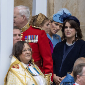 En effet, comme ses cousines, elle avait participé à un dîner la veille et était rentrée à 2h30 du matin !
La princesse Beatrice d'York, La princesse Eugenie d'York, enceinte, Zara Phillips (Zara Tindall), - Sortie de la cérémonie de couronnement du roi d'Angleterre à l'abbaye de Westminster de Londres, Royaume Uni, le 6 mai 2023. 