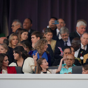 Catherine (Kate) Middleton, princesse de Galles, la princesse Charlotte de Galles, le prince George de Galles et le prince William, prince de Galles au concert du couronnement du roi et de la reine dans l'enceinte du château de Windsor, Royaume Uni, le 7 mai 2023.