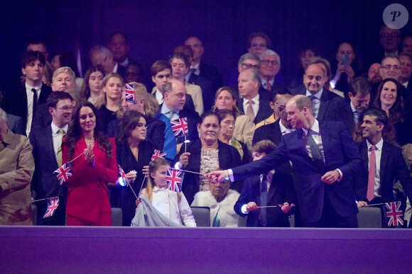 Catherine (Kate) Middleton, princesse de Galles, la princesse Charlotte de Galles, le prince George de Galles et le prince William, prince de Galles au concert du couronnement du roi et de la reine dans l'enceinte du château de Windsor, Royaume Uni, le 7 mai 2023.