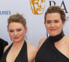 Sa fille Mia avait en effet fait le déplacement car elle est devenue actrice elle aussi.
Dominic Savage, Mia Threapleton, Kate Winslet - Photocall de la cérémonie des BAFTA Television Awards 2023 au Royal Festival Hall à Londres le 14 mai 2023. 