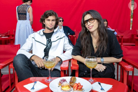 Maïwenn et son fils Diego Le Fur au défilé Etam Croisière 2023 à Saint-Tropez le 11 mai 2023. © Rachid Bellak / Bestimage