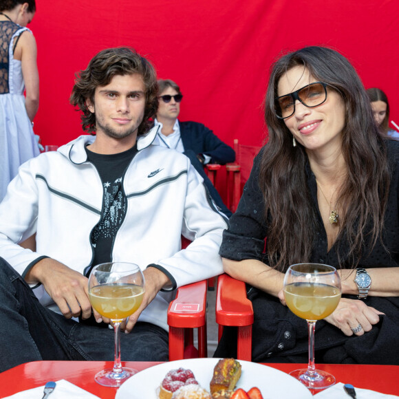 Maïwenn et son fils Diego Le Fur au défilé Etam Croisière 2023 à Saint-Tropez le 11 mai 2023. © Rachid Bellak / Bestimage
