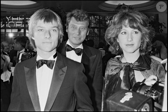 Archives - David Hallyday, Johnny Hallyday et Nathalie Baye lors de la soirée des "Bests" à Paris en 1983.