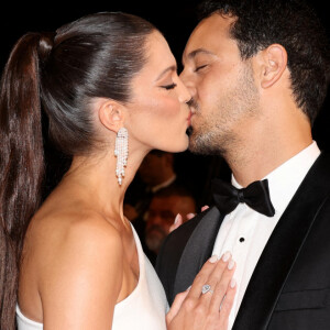 Iris Mittenaere et son fiancé Diego El Glaoui - Montée des marches du film " Le retour (Homecoming) " lors du 76ème Festival International du Film de Cannes, au Palais des Festivals à Cannes. Le 17 mai 2023 © Jacovides-Moreau / Bestimage 