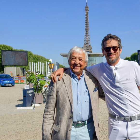 Exclusif - Guillaume Canet et son père Philippe lors du Longines Paris Eiffel Jumping au Champ de Mars à Paris, France, le 7 juillet 2019. © Pierre Perusseau/Bestimage 