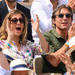 Anne-Claire Coudray est une femme très discrète.
Anne-Claire Coudray et son compagnon Nicolas Vix lors du Tournoi de Roland-Garros, à Paris. © Laurent Zabulon/ABACAPRESS.COM