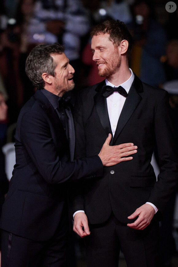 Guillaume Canet, Just Philippot - Montée des marches du film " Acide " lors du 76ème Festival International du Film de Cannes, au Palais des Festivals à Cannes. Le 21 mai 2023 © Jacovides-Moreau / Bestimage