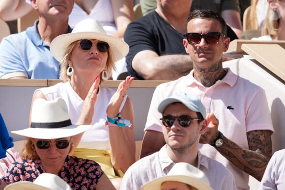 France Pierron et son compagnon Amaury dans les tribunes lors des Internationaux de France de Tennis de Roland Garros 2023. Paris, le 29 mai 2023. © Jacovides / Moreau / Bestimage