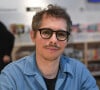 Thomas Porcher lors du "Festival du Livre de Paris", qui se tient du 21 au 23 avril 2023 au ‎Grand Palais Ephémère. Paris, le 22 avril 2023.