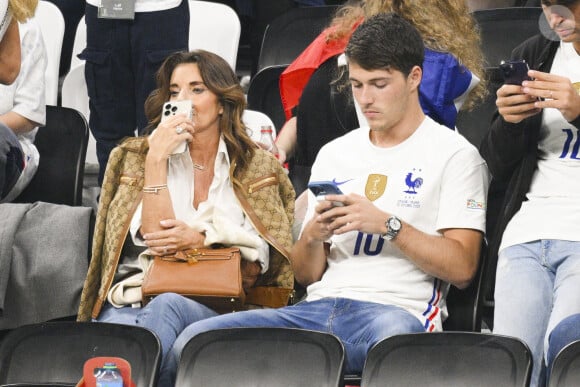 Claude Deschamps - femme de Didier Deschamps entraineur / Selectionneur France et leur Fils Dylan Deschamps - People et joueurs en famille dans les tribunes lors du match de demi-finale "France - Maroc" lors de la Coupe du Monde 2022 au Qatar (FIFA World Cup Qatar 2022). © JB Autissier / Panoramic / Bestimage