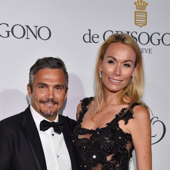 Pourtant plutôt grand (1,79 m), Richard Virenque est bien plus petit que sa compagne sculpturale

Richard Virenque et sa compagne Marie-Laure - Photocall de la soirée de Grisogono à l'hôtel Eden Roc au Cap d'Antibes lors du 68 ème Festival du film de Cannes à Cannes le 19 mai 2015.