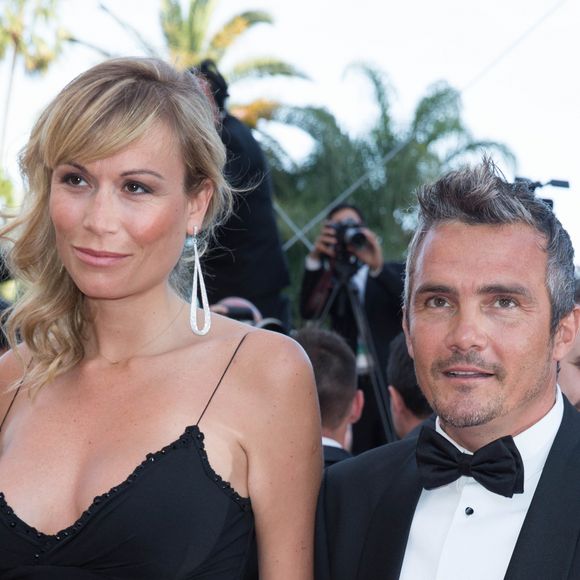 Le couple s'est notamment rendu au Festival de Cannes en 2014 et on a pu constater cette différence de taille

Richard Virenque et sa compagne Marie-Laure - Montée des marches du film "Deux jours, une nuit" lors du 67 ème Festival du film de Cannes – Cannes le 20 mai 2014.