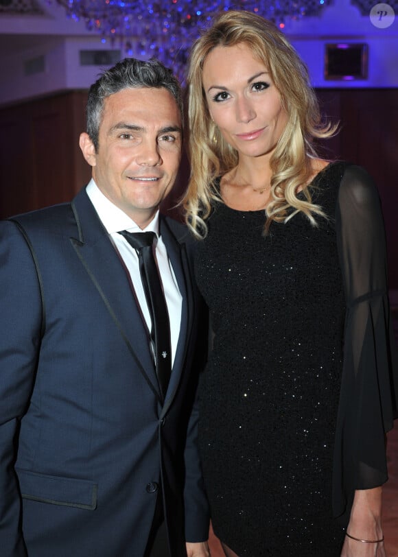 Richard Virenque et sa compagne Marie-Laure - Soiree "The Best Awards 2013" de Massimo aux Salons Hoche a Paris, le 16 decembre 2013.