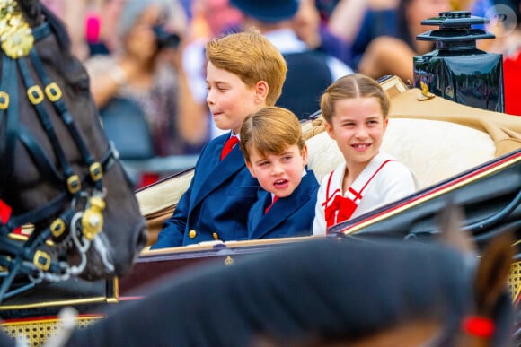 Le petit garçon, en tout cas, semble prêt pour cette belle étape ! 
Le prince George, le prince Louis et la princesse Charlotte de Galles - La famille royale d'Angleterre lors du défilé "Trooping the Colour" à Londres. Le 17 juin 2023 