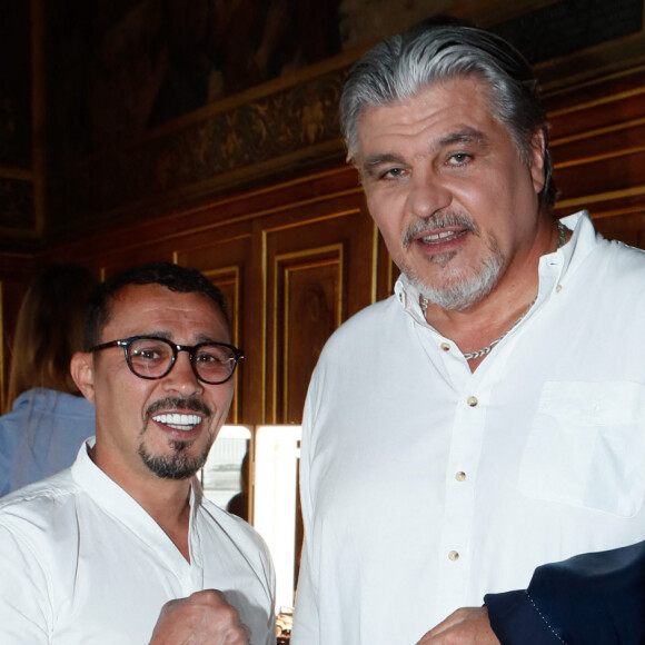 Exclusif - Brahim Asloum, David Douillet - Backstage - Enregistrement de l'émission "Paris 2024 le concert événement...dans un an les jeux" sur le parvis de l'Hôtel de Ville de Paris, diffusée sur France 2 à 21h10. © Tiziano Da Silva-Christophe Clovis / Bestimage
