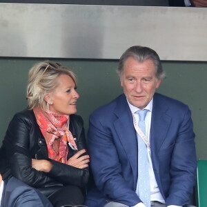 Mais hors de question pour lui de passer le plus clair de son temps devant les écrans !
Sophie Davant et William Leymergie - People dans les tribunes des Internationaux de France de tennis de Roland Garros à Paris. Le 26 mai 2015 