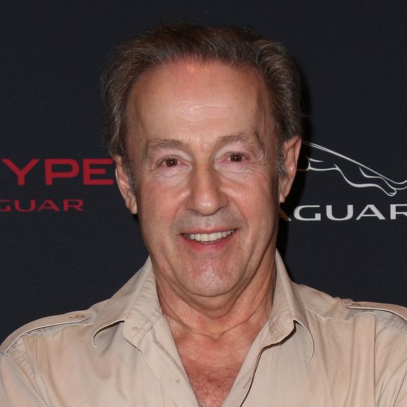 Gerard Klein pose pour le lancement de la nouvelle jaguar F-Type à Paris a L'atrium Banque. France le 31 Janvier 2013