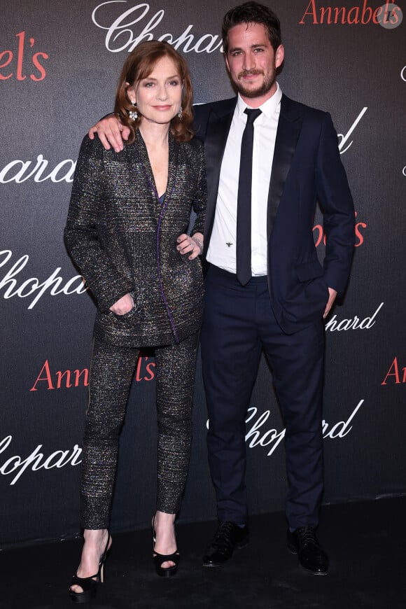 Isabelle Huppert et son fils Lorenzo Chammah - Photocall du dîner Caroline et Karl-Friedrich Scheufele avec le club Annabel's lors du 69ème Festival International du Film de Cannes. Le 14 mai 2016 