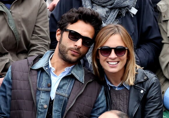 Maxim Nucci (Yodelice) et sa compagne Isabelle Ithurburu dans les tribunes des Internationaux de France de tennis de Roland Garros à Paris. Le 24 mai 2016 © Dominique Jacovides / Bestimage