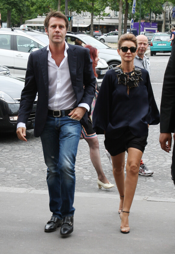 Le prince Emmanuel Philibert de Savoie et son epouse Clotilde Courau - People arrivant au defile Haute-Couture Automne-Hiver 2013/2014 "Armani Prive" au Palais de Chaillot a Paris, le 2 juillet 2013. 