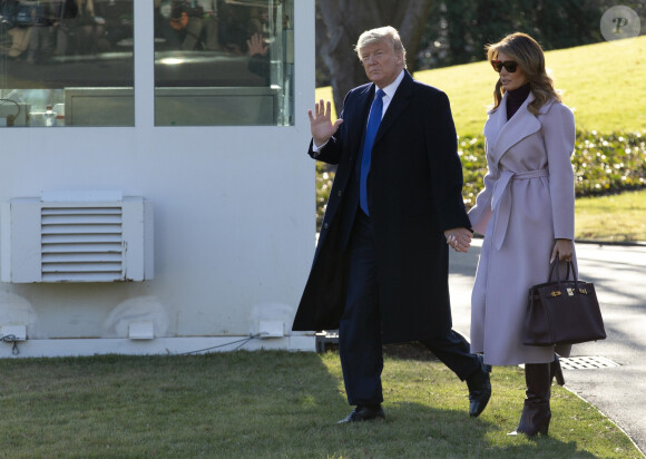 Donald J. Trump (président des Etats-Unis), avec sa femme Melania et son fils Barron, quittent la Maison Blanche en hélicoptère. Washington DC, le 15 janvier 2020. 