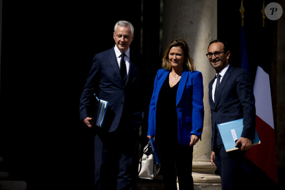 Bruno Le Maire - ministre de l Economie - des Finances et de la Souverainete industrielle et Numerique Olivia Gregoire - ministre chargee des Petites et Moyennes Entreprises - du Commerce - de l Artisanat et du Tourisme - Arrivées au conseil des ministres au palais présidentiel de l'Elysée à Paris, France, le 21 juillet 2023. La présidence française a officialisé le remaniement du gouvernement français le 20 juillet 2023 avec huit nouveaux membres d'un gouvernement qui compte 41 ministres au total. © Jean-Baptiste Autissier/Panoramic/Bestimage 