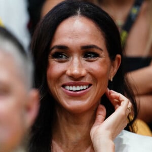 Le prince Harry, duc de Sussex et Meghan Markle, duchesse de Sussex, assistent au match de basket-ball en fauteuil roulant à la Merkur Spiel-Arena lors des Jeux Invictus à Düsseldorf (Allemagne), le 13 septembre 2023. 