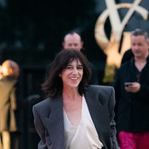 "A un moment j'ai eu des soucis d'argent et j'ai pensé vendre notre maison avec Yvan et venir au 5 bis, assure-t-elle. Et je crois qu'Yvan m'a dit : 'Tu te fous de ma gueule !'
Charlotte Gainsbourg au défilé Summer 2024 Saint-Laurent intitulé "Each Man Kills The Thing He Loves" à Berlin, le 12 juin 2023.