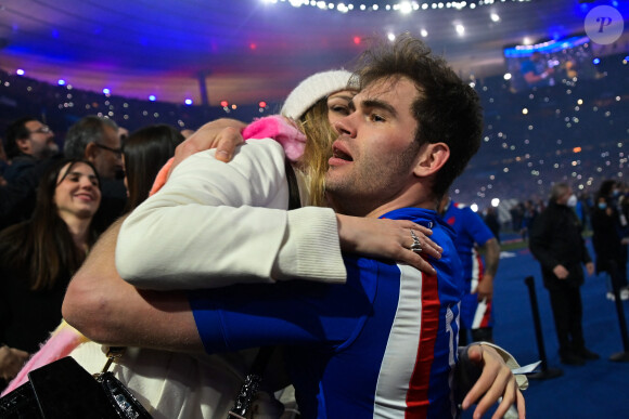 Damian Penaud et Morgane Vernet - La France s'offre le grand chelem dans le Tournoi des six nations, après sa victoire 25-13 contre l'Angleterre au stade de France, à Saint-Denis, Seine Saint-Denis, France, le 19 mars 2022. © Federico Pestellini/Panoramic/Bestimage