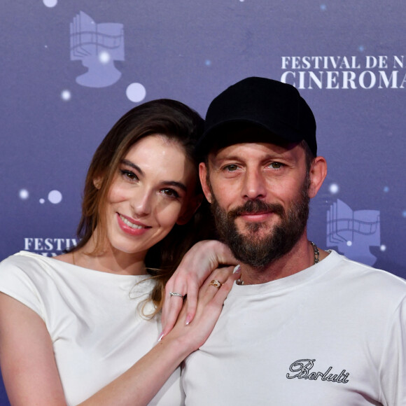 Tout comme Nicolas Duvauchelle, qui participait au festival avec sa fiancée Chloé Roy.
Nicolas Duvauchelle et sa compagne Chloé Roy - 5e édition du Festival CinéRoman au cinéma Pathé Gare du Sud à Nice, le 5 octobre 2023. © Bruno Bebert/Bestimage