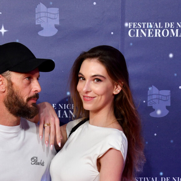 La ville de Nice reçoit le Festival CinéRoman du 2 au 7 octobre 2023 pour une 5e édition.
Nicolas Duvauchelle et sa compagne Chloé Roy - 5e édition du Festival CinéRoman au cinéma Pathé Gare du Sud à Nice, le 5 octobre 2023. © Bruno Bebert/Bestimage