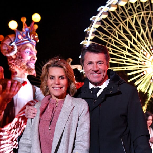 Christian Estrosi, le maire de Nice, et sa femme Laura Tenoudji Estrosi durant l'ouverture du Carnaval de Nice 2022, Roi des Animaux, place Masséna à Nice, le 11 février 2022. La 137eme édition du 1er carnaval de France et l'un des plus célèbres du monde, attirant chaque année des centaines de milliers de spectateurs va durer jusqu'au 27 février alternant corso carnavalesque et batailles de fleurs. Cette année des mesures liées à la crise sanitaire sont appliquées, à savoir une jauge à 5000 spectateurs ou le pass sanitaire demandé pour accéder dans l'enceinte du corso. Nice, le 11 février 2022. © Bruno Bebert/Bestimage 