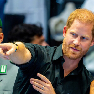 Le prince Harry, duc de Sussex et Meghan Markle, duchesse de Sussex, participent à une remise de médailles lors des Invictus Games 2023 (Day 4) à Dusseldorf, le 13 septembre 2023. 