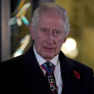 Le roi Charles III d'Angleterre dévoile une statue de la reine Élisabeth II à son arrivée au Royal British Legion Festival of Remembrance au Royal Albert Hall à Londres : samedi 11 novembre 2023.