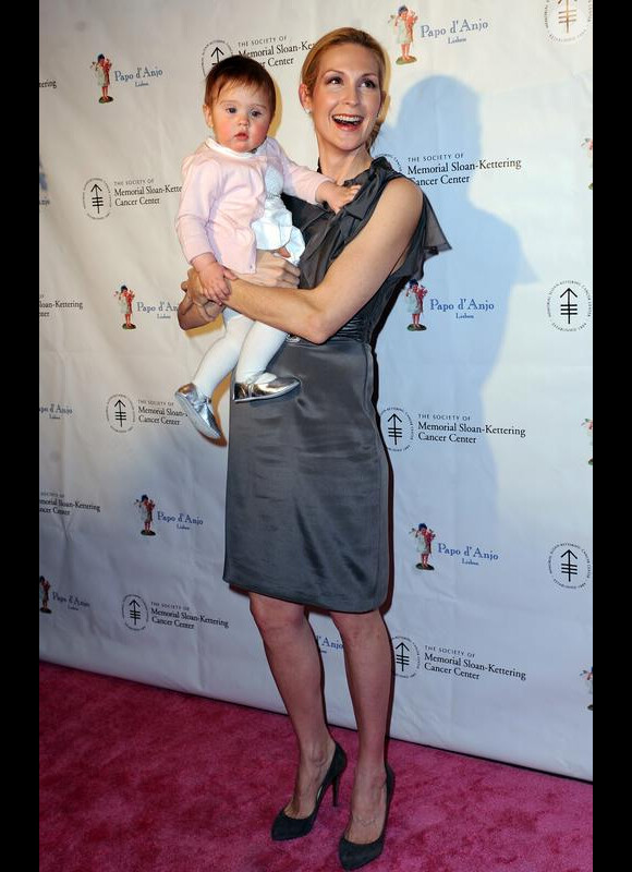 Kelly Rutherford, venue accompagnée de sa petite Helena, 9 mois, lors de la soirée annuelle des Bunny Hop, à New York, le mardi 9 mars.
