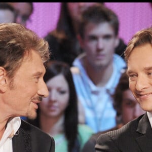 Les relations avec son père n'ont pas toujours été simples
Johnny et David Hallyday invités du "Grand Journal" sur Canal + en en octobre 2008.